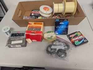 lot 19AM image: Large Lot of Fishing Line and Accessories Including Berkley, Sufix, and Guidebrod Brands