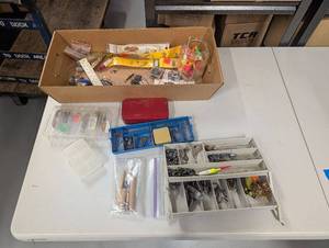 lot 25AM image: Assorted Fishing Tackle Lot with Lures, Hooks, Bobbers, and Accessories for Hobbyists
