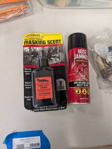 lot 30AM image: Lot of Hunting Scent Products Including Wildlife Research Center Red Fox Urine Masking Scent