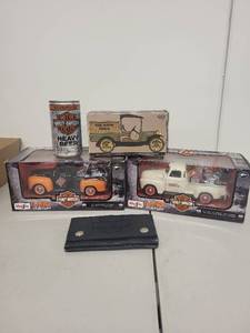 lot 13J image: Harley-Davidson Collectibles Set Wallet, Diecast Trucks, Tin, Heavy Beer Can