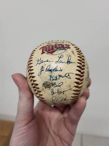 lot 43J image: Minnesota Twins Team Signed Baseball with 6 Vintage Sports Magazines