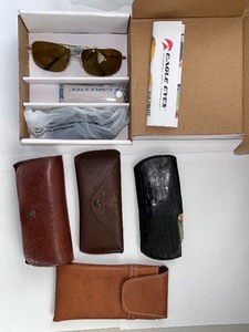 lot 224W image: Collection of 3 Vintage Sunglasses with Cases and Eagle Eyes Navigator Kit
