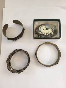 lot 102W image: Group of 3 Brass Bracelets and Brass Unicorn Belt Buckle