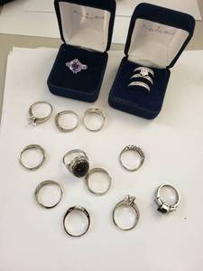 lot 138W image: Collection of 12 Silver Plated Cubic Zirconia Rings with Assorted Stone Designs