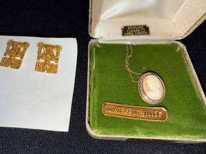 lot 210W image: 12K Gold Filled Cameo Necklace with Hand Carved Pendant and Pair of Ornate Mexican God of the Dead Gold-Tone Clip-On Earrings