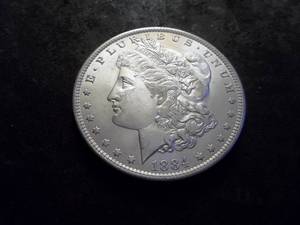 lot 8 image: 1884 O  Morgan Silver Dollar