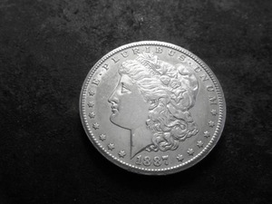 lot 11 image: 1887 S  Morgan Silver Dollar