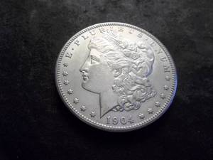 lot 20 image: 1904 O Morgan Silver Dollar