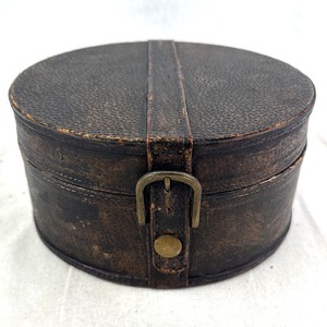 lot 84 image: Vintage Round Leather Hat Box & Brass Buckle Closure