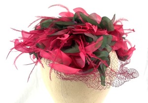 lot 96 image: Pink Floral Fascinator Headpiece With Netting