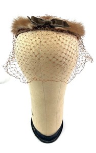 lot 105 image: Brown Fur Trim Fascinator Hat & Net Veil