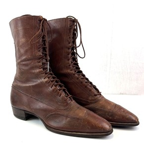 lot 125 image: Brown Leather Knee-High Wingtip Lace-Up Boots