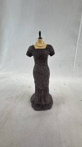 lot 154 image: Elegant Dress Figurine & Gold High Heel with Vintage Watkins Body Powder Tin