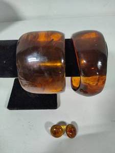 lot 68 image: Two Large Lucite Bangles & Matching Earrings