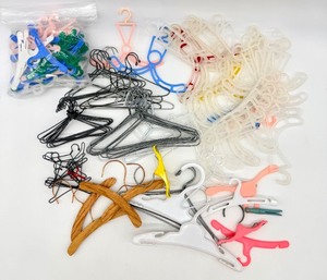 lot 9 image: Assorted Doll Plastic & Wooden Hangers Set with Accessories including Barbie