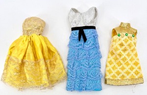 lot 17 image: Barbie Doll Dresses Set Yellow Satin Lace Overlay, Blue Lace Skirt, Gold Lace Dress