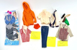 lot 20 image: Ken Doll Lot 1962-1963 With Original Swimsuit, Jeans & Striped Outfits