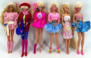 lot 99 image: Barbie Fashion Dolls Lot & Colorful Outfits