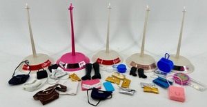 lot 107 image: Barbie Holidays & Fantasy Display Stands with Mini Accessories