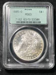lot 14 image: 1885-O US MORGAN SILVER DOLLAR PCGS MS63