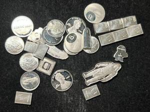lot 30 image: 32 GRAMS .999 FINE SILVER FRACTIONAL PIECES