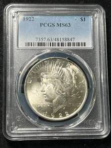 lot 40 image: 1922 US PEACE SILVER DOLLAR PCGS MS63