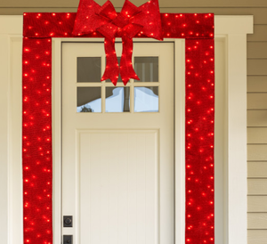 lot 47 image: Lighted Christmas Tinsel Doorway Arch with Removable Bow for Roof Door Fireplace