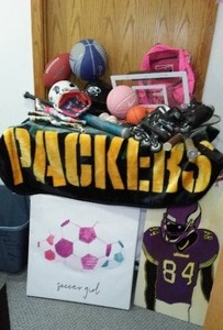 lot 244 image: Sporting Goods Balls, Blanket, Baseball Helmet and More.