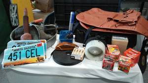 lot 259 image: Automotive Lot, Seat Organizers, Oil Filters, plugs and more.