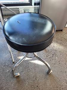 lot 143 image: Adjustable Rolling Stool with Black Vinyl Seat and Chrome Base
