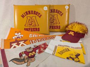 lot 4 image: Minnesota Golden Gophers Memorabilia Collection with Pennants, Seat Cushions, and Hat