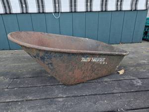 lot 47 image: Black Metal Wheelbarrow Planter