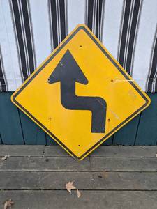 lot 57 image: Used Metal Curve Ahead Road Sign