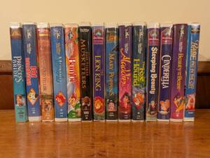 lot 92 image: Collection of 14 Vintage Disney and MGM VHS Tapes Including Sealed Old Yeller