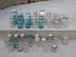 lot 135 image: Collection of 30 Vintage Mason Jars and Canning Jars with Lids