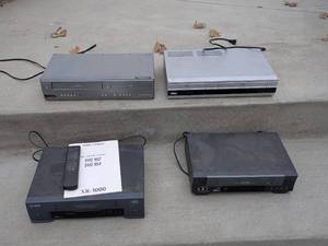 lot 178 image: Group of 4 VHS and DVD Players with Remote and Manual