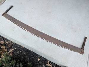 lot 186 image: Antique Two-Man Crosscut Logging Saw with Wooden Handles
