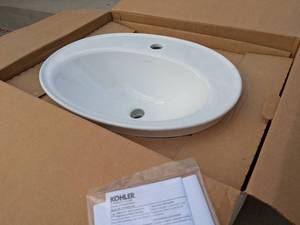 lot 217 image: Kohler Serif 22.25 Inch White Oval Drop-In Sink K-2975-1-0 Unopened in Box