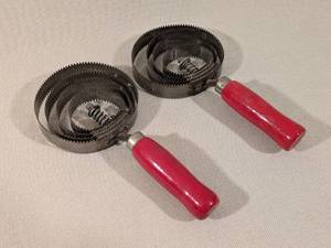 lot 240 image: Pair of Vintage Serrated Curry Comb & Sweat Scraper Tools for Horses with Red Handles