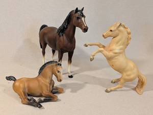 lot 245 image: Breyer Model Horse Trio Proud Arabian Mare, Lying Down Foal, Palomino Rearing Horse