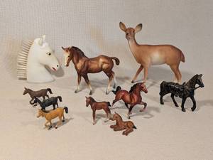lot 250 image: Collection of 10 Breyer and Other Miniature Horse Figurines, Plus Deer and Horse Head Brush
