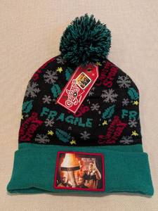 lot 252 image: A Christmas Story Fragile Pom Beanie Hat by Warner Bros.