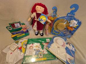 lot 258 image: Madeline 15-Inch Rag Doll with Outfits, Magnetic Doll Set, and Accessories