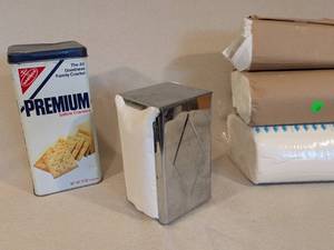 lot 286 image: Vintage Nabisco Premium Saltine Crackers Tin and Metal Napkin Dispenser with Paper Towel Packs