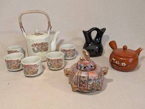 lot 298 image: Japanese Tea Sets and Adakai Navajo Blackware Wedding Vase Collection