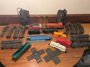 lot 338 image: Lionel O Gauge Model Train Set Pieces with Track, Switches, and Cars - not a working set, missing transformer