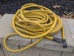 lot 145 image: Yellow 123 SJTW 50ft Extension Cord with Ends
