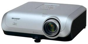 lot 93 image: MSRP $750 Sharp XR-10XL DLP Projector with Carrying Case Bright 2000 ANSI lumens & 20001 contrast for crisp, vivid images. Compact 8.6 lb design, perfect for mobile presentations, home theaters, or outdoor movie nights.