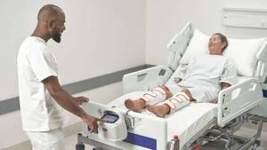 lot 48 image: WOW MSRP $6000 Arjo Huntleigh Flowtron ACS900 Universal Pump with Calf Garment -Intermittent pneumatic compression (IPC) therapy system (Treatment DVTVTE) wauto-recognition of thigh, calf, or foot garments - Works Great