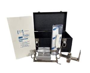 lot 96 image: Padgett Dermatome Set  Precision surgical instrument for harvesting split-thickness skin grafts. Includes dermatome, carrying case, 3M Dermatome Tape, and sterile accessories. Ideal for reconstructive surgery and consistent, reliable results.